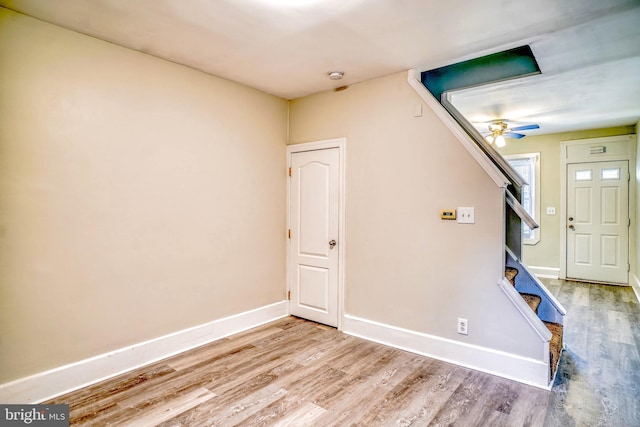 interior space featuring hardwood / wood-style floors and ceiling fan