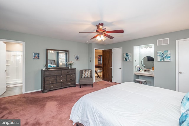 bedroom featuring visible vents, baseboards, ensuite bath, ceiling fan, and carpet