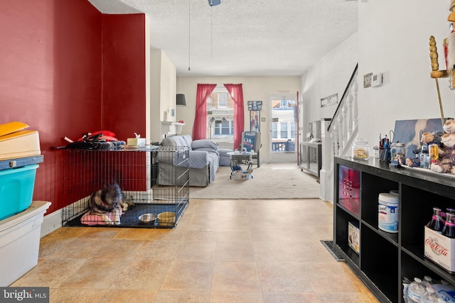 interior space featuring a textured ceiling