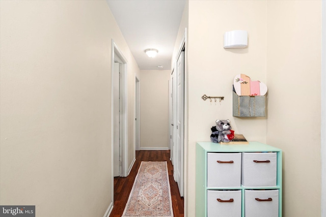 hall featuring dark wood-type flooring