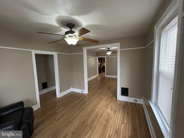 unfurnished room featuring wood-type flooring