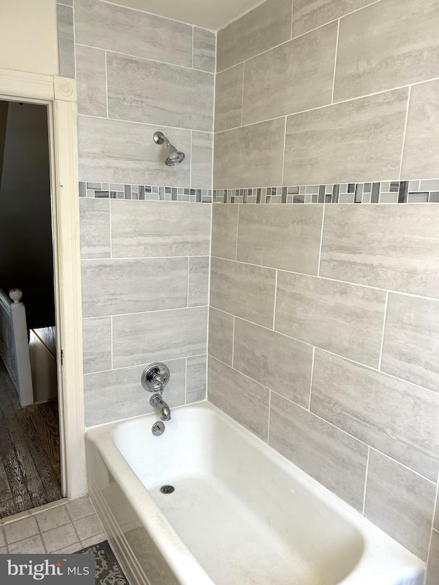 bathroom with tile patterned floors