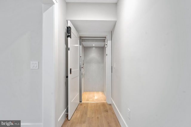 hall featuring light hardwood / wood-style floors