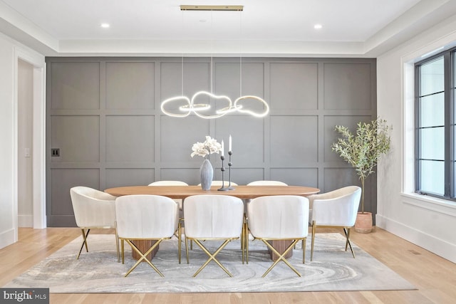 dining room with light wood-type flooring