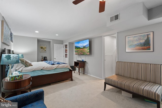 bedroom with light carpet and ceiling fan