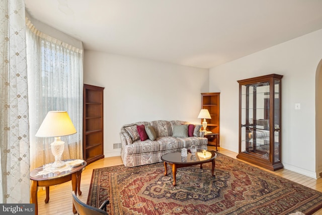 living room with light hardwood / wood-style floors