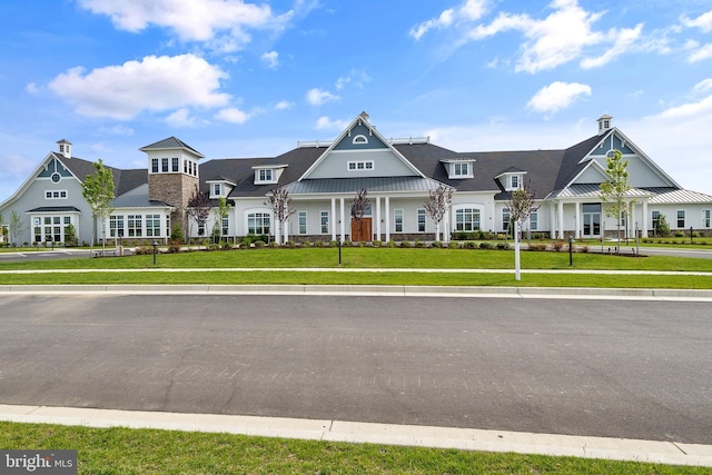 view of front of home featuring a front lawn