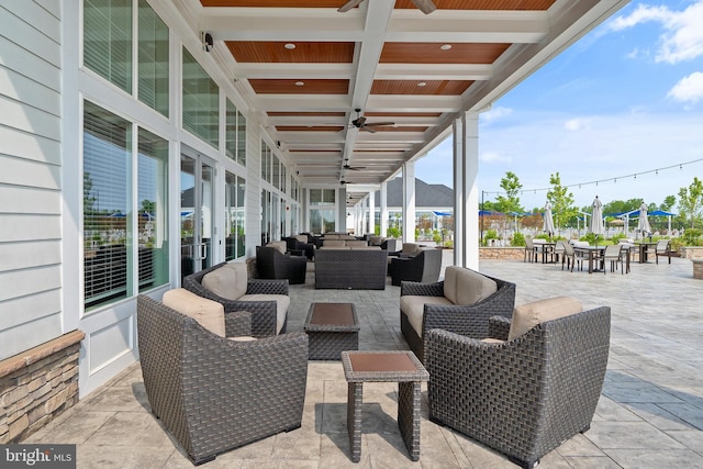 view of patio / terrace featuring an outdoor hangout area and ceiling fan