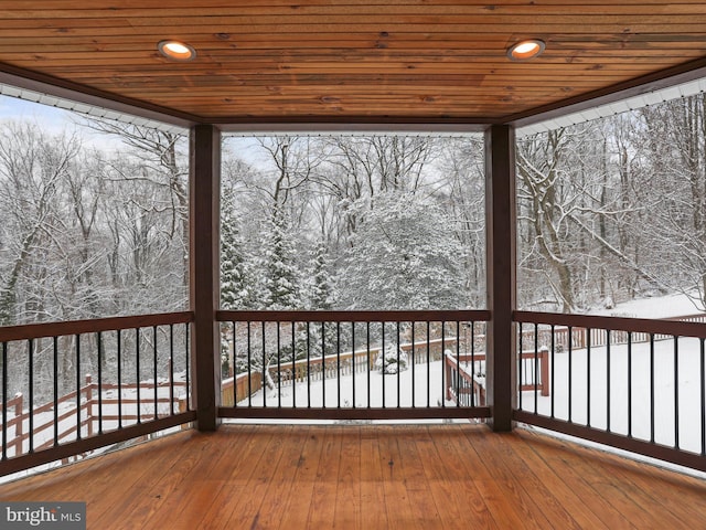 view of snow covered deck