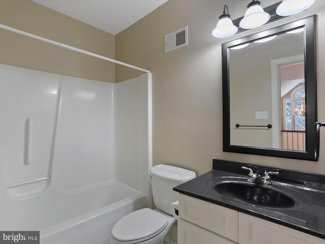 full bathroom featuring shower / tub combination, vanity, and toilet