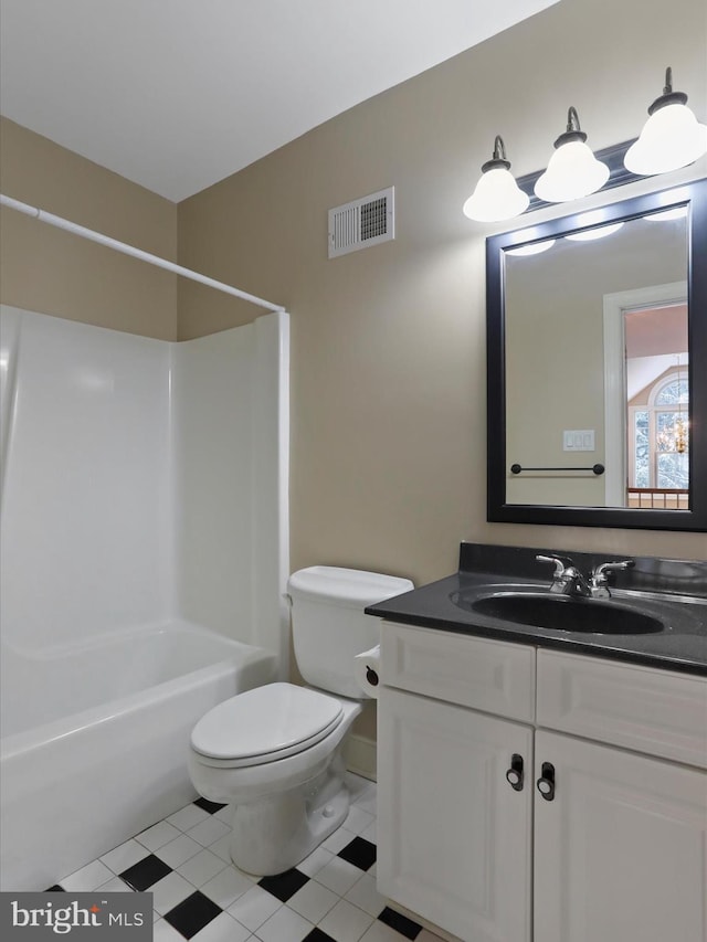 full bathroom featuring vanity, toilet, and shower / bath combination