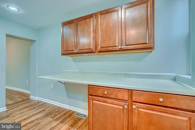 kitchen with light hardwood / wood-style flooring