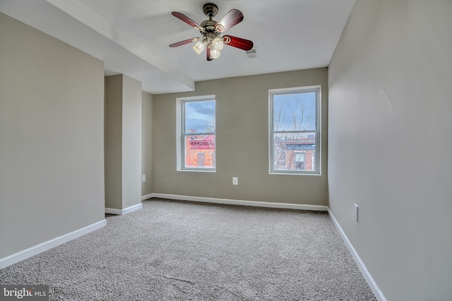 unfurnished room featuring carpet floors and ceiling fan