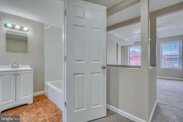 bathroom with vanity and tile patterned flooring