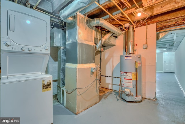 utility room with stacked washer and dryer and gas water heater