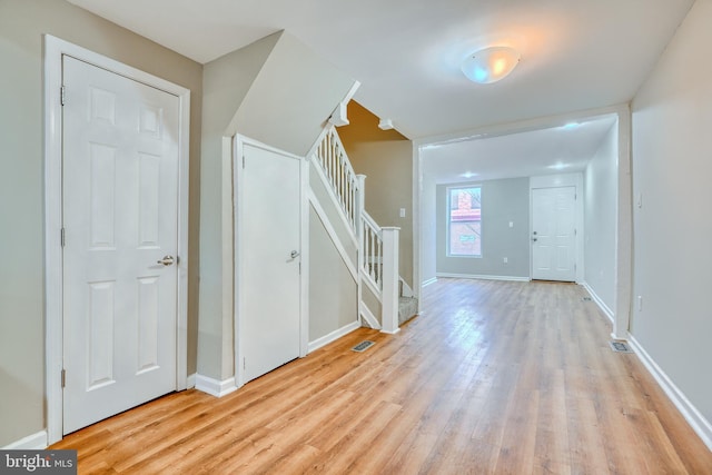 entrance foyer featuring light hardwood / wood-style floors