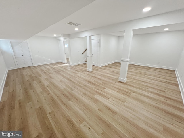 basement featuring light wood-type flooring