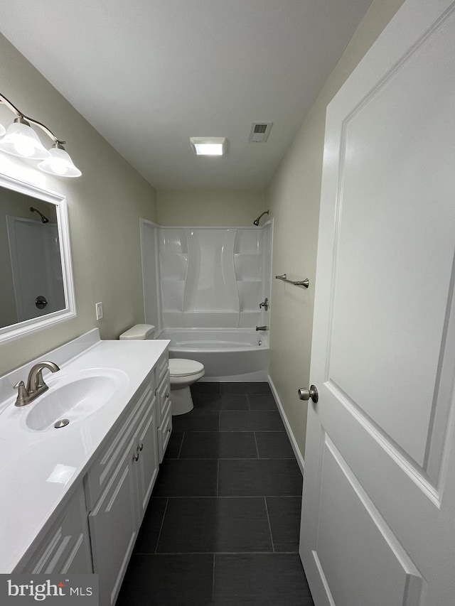 full bathroom featuring tile patterned flooring, vanity, shower / bathing tub combination, and toilet