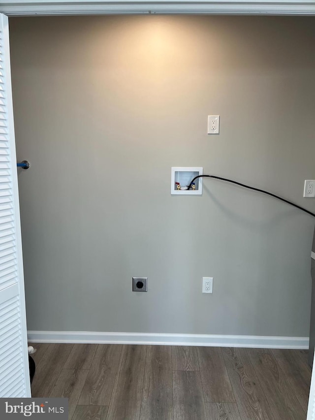 laundry room featuring washer hookup, dark hardwood / wood-style floors, and hookup for an electric dryer