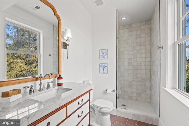 full bath featuring visible vents, a healthy amount of sunlight, and a shower stall