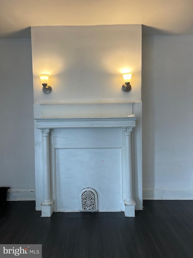 interior details featuring hardwood / wood-style flooring