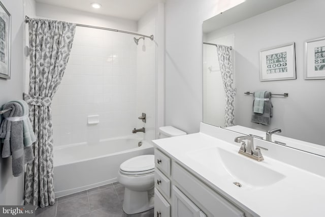 full bathroom featuring vanity, tile patterned floors, toilet, and shower / tub combo with curtain