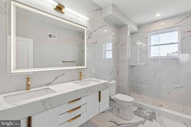 bathroom featuring an enclosed shower, vanity, tasteful backsplash, and toilet