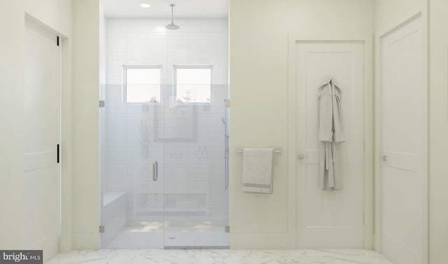 bathroom with an enclosed shower