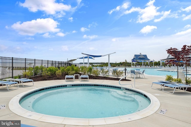 view of swimming pool featuring a patio