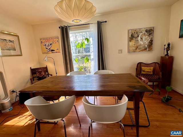 dining area featuring hardwood / wood-style flooring