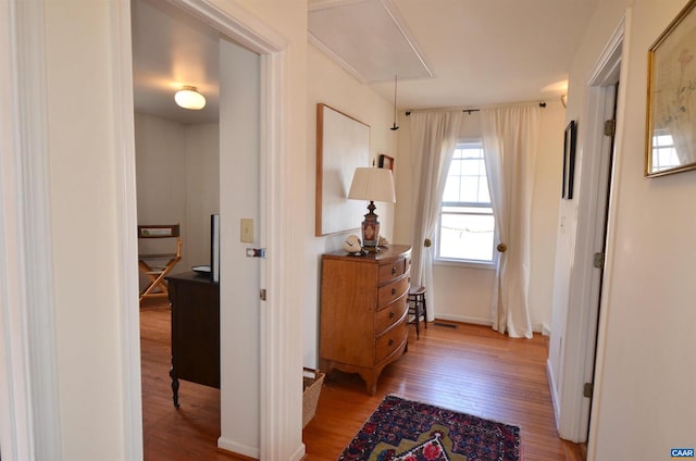 corridor featuring hardwood / wood-style flooring