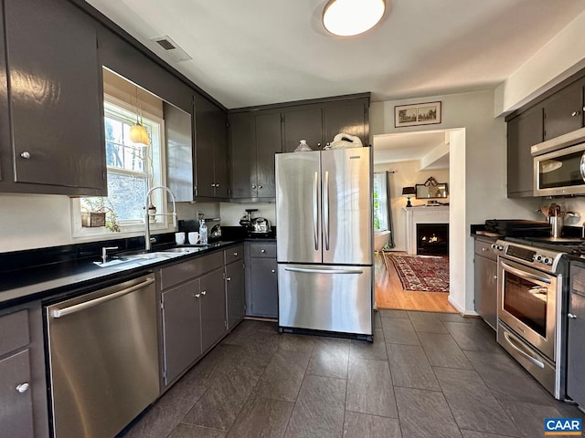 kitchen featuring appliances with stainless steel finishes and sink