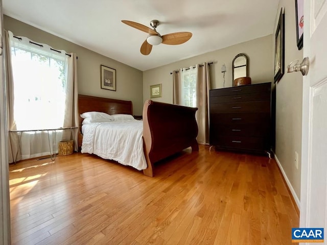 unfurnished bedroom featuring ceiling fan and light hardwood / wood-style flooring