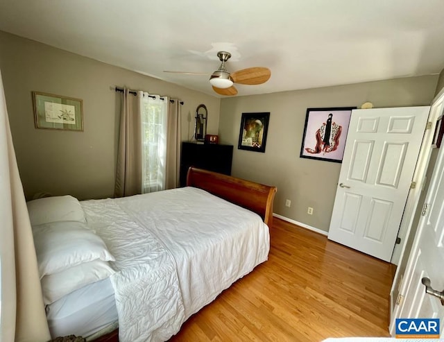 bedroom featuring ceiling fan and light wood-type flooring