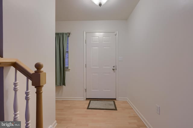 foyer with light wood-type flooring