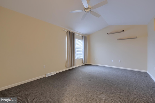 spare room with lofted ceiling, carpet floors, and ceiling fan