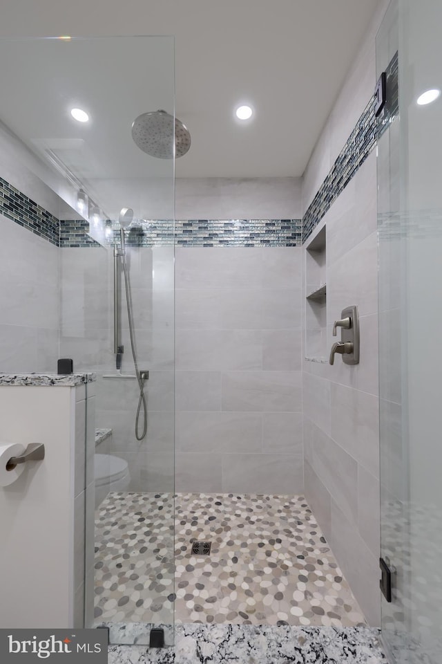 bathroom with an enclosed shower