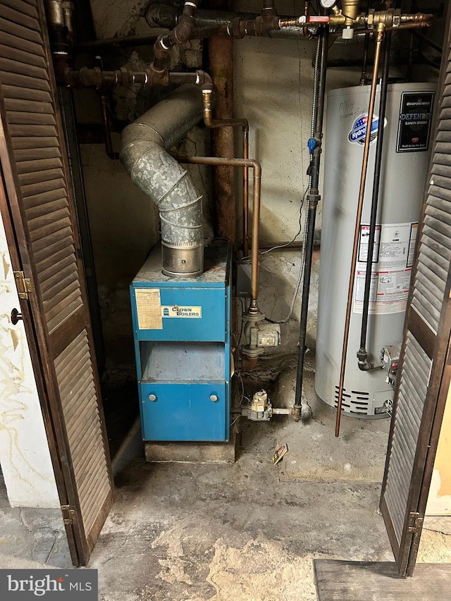 utility room featuring gas water heater