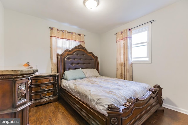 bedroom featuring dark hardwood / wood-style floors