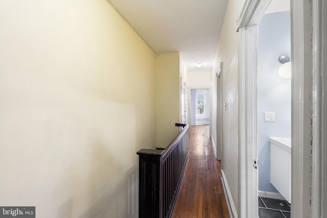 hallway featuring dark wood-type flooring