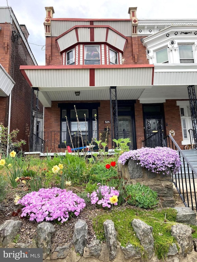 view of front of home featuring covered porch