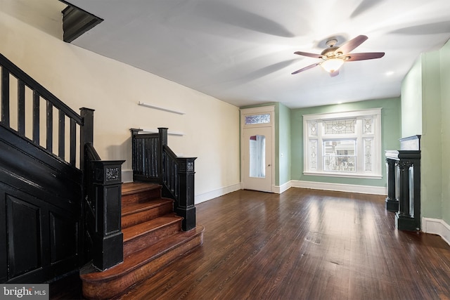 entrance foyer featuring ceiling fan and dark hardwood / wood-style floors