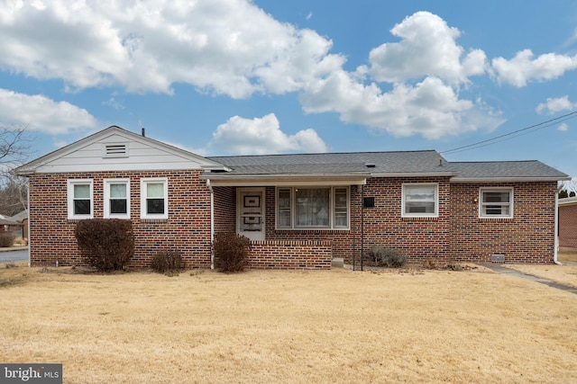 ranch-style home with a front yard