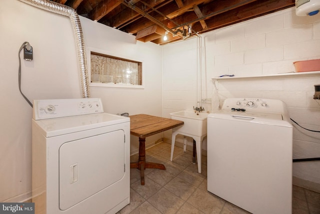 washroom featuring washing machine and dryer