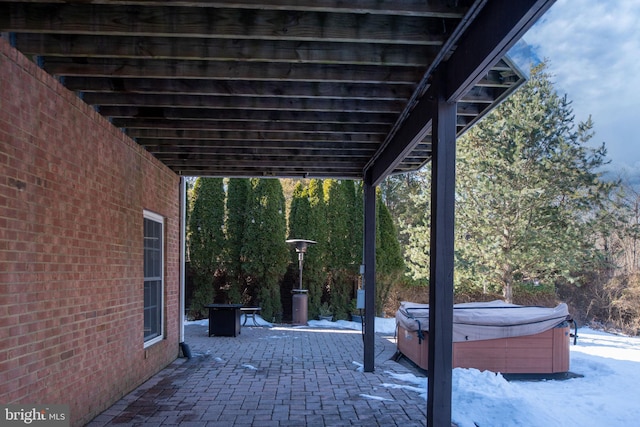 view of patio / terrace featuring a hot tub