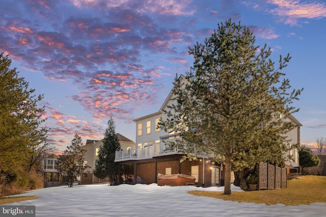 exterior space featuring a hot tub