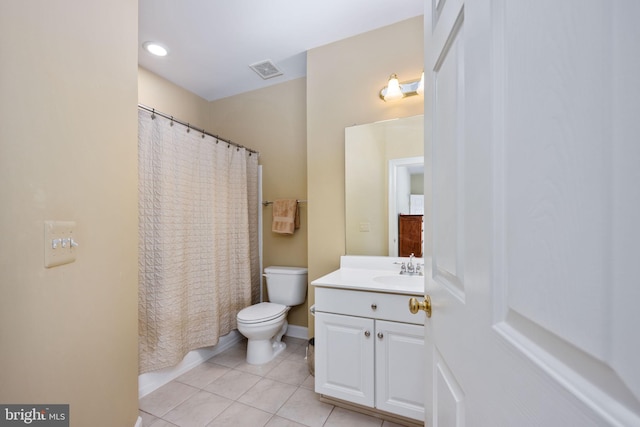 bathroom featuring vanity, tile patterned flooring, a shower with curtain, and toilet