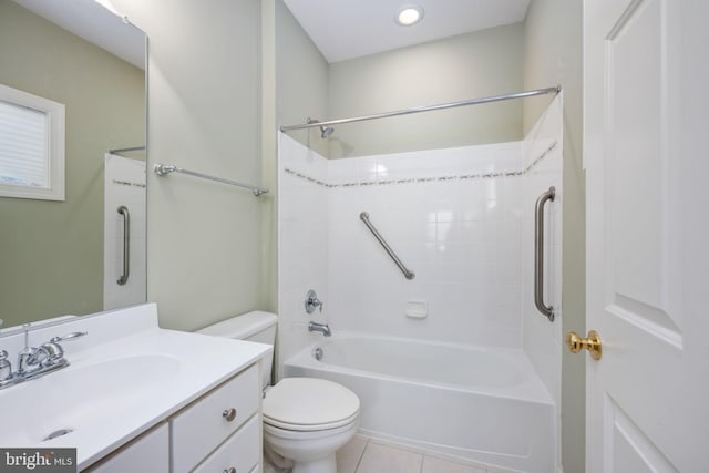 full bathroom featuring vanity, tile patterned floors, toilet, and washtub / shower combination