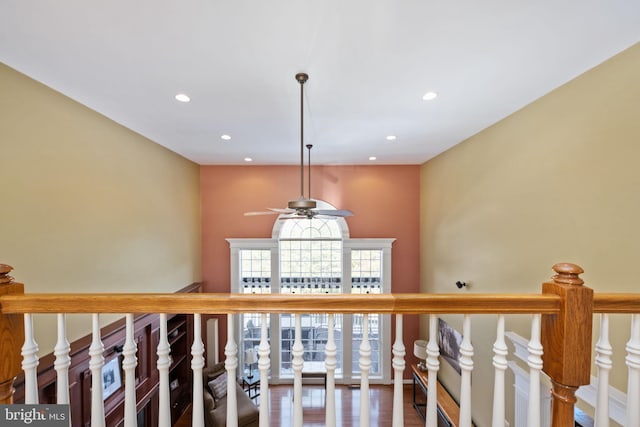 stairs with ceiling fan