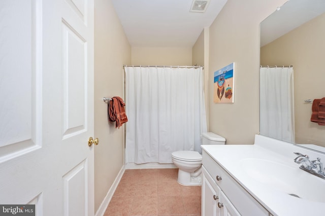 bathroom with vanity, curtained shower, tile patterned floors, and toilet